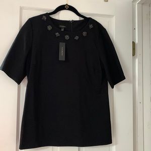 NWT.  Talbots black top with black crystal decoration across neckline. Size L